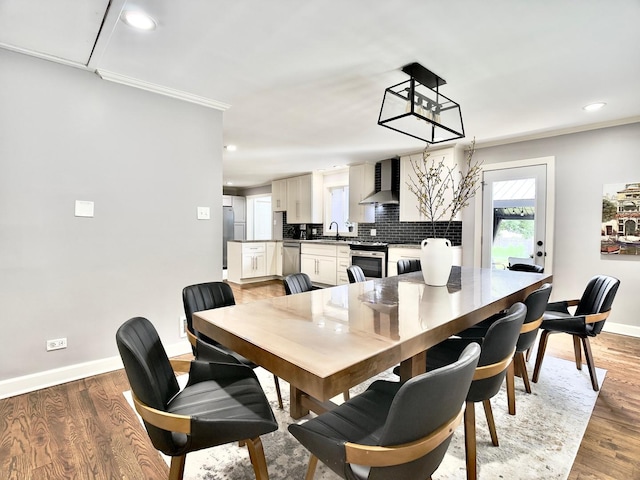120 Walter Ct, Bloomingdale, IL 60108 - dining area featuring recessed lighting, crown molding, and light wood finished floors