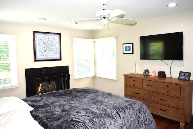 46 Copperwood Dr, Buffalo Grove, IL 60089 - bedroom with dark wood-type flooring, a high end fireplace, recessed lighting, and ceiling fan