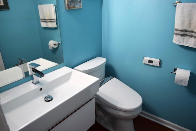 46 Copperwood Dr, Buffalo Grove, IL 60089 - half bathroom featuring toilet and vanity