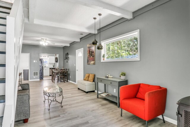 41607 N Lotus Ave, Antioch, IL 60002 - living area featuring beamed ceiling, wood finished floors, and ceiling fan