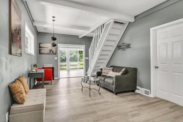 41607 N Lotus Ave, Antioch, IL 60002 - living area with beamed ceiling, stairs, and wood finished floors