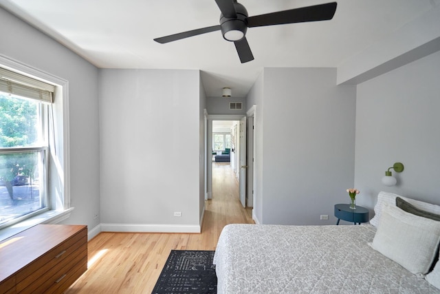 1654 W Berwyn Ave Unit 2W, Chicago, IL 60640 - bedroom with light wood-type flooring, multiple windows, and ceiling fan