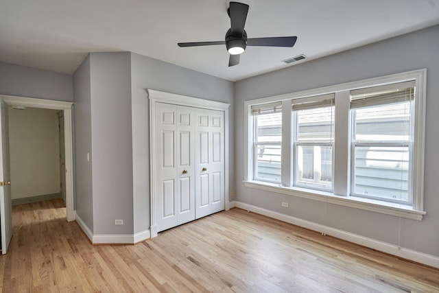 1654 W Berwyn Ave Unit 2W, Chicago, IL 60640 - unfurnished bedroom featuring light wood-type flooring, a closet, and a ceiling fan