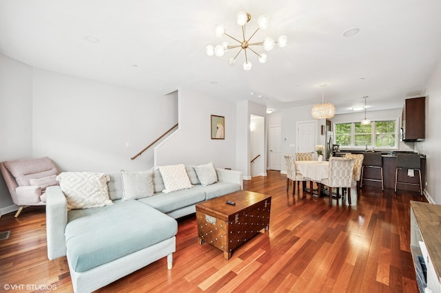 1657 Church St, Evanston, IL 60201 - living area featuring a chandelier and wood finished floors