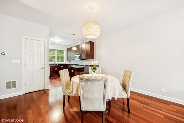 1657 Church St, Evanston, IL 60201 - dining room with dark wood-type flooring
