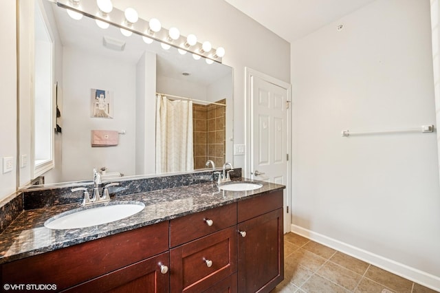 1657 Church St, Evanston, IL 60201 - bathroom with double vanity, tile patterned floors, and a shower with curtain