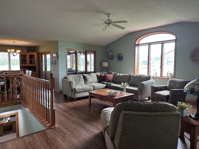 15459 Henry Rd Unit A, Morrison, IL 61270 - living area featuring a chandelier, vaulted ceiling, wood finished floors, a ceiling fan, and a textured ceiling