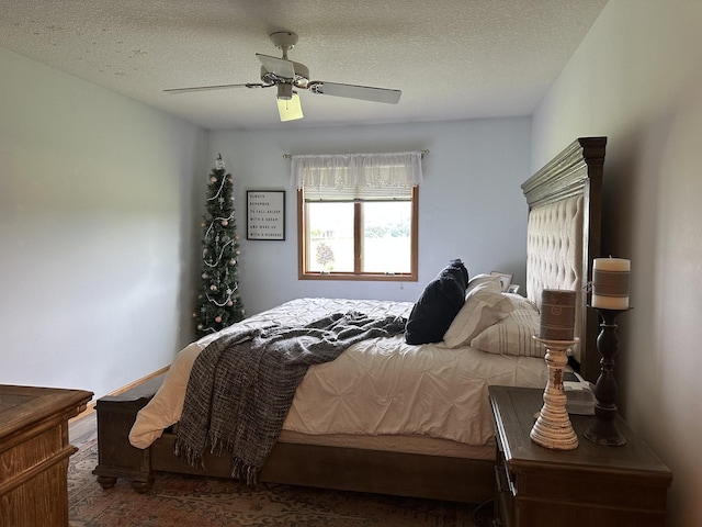 15459 Henry Rd Unit A, Morrison, IL 61270 - bedroom with a textured ceiling and ceiling fan