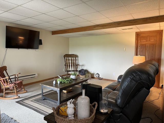 15459 Henry Rd Unit A, Morrison, IL 61270 - living area with carpet flooring, a drop ceiling, and a baseboard heating unit