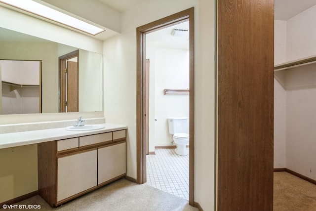 4130 N Pheasant Trail Ct Unit 2, Arlington Heights, IL 60004 - bathroom featuring vanity and a closet