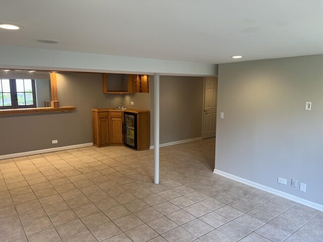 7830 Westview Ln, Woodridge, IL 60517 - below grade area featuring recessed lighting, wine cooler, light tile patterned flooring, and bar area