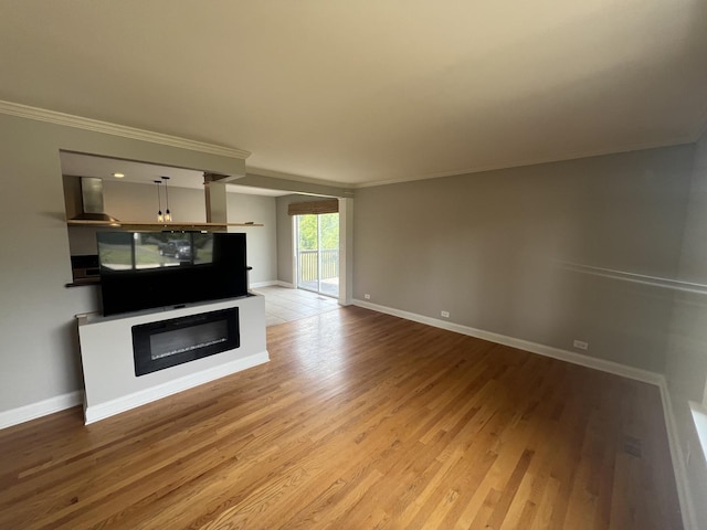 7830 Westview Ln, Woodridge, IL 60517 - unfurnished living room featuring light wood-type flooring and crown molding