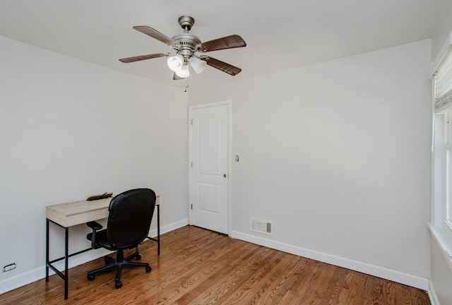 974 Webster Ln, Des Plaines, IL 60016 - home office featuring ceiling fan and wood finished floors