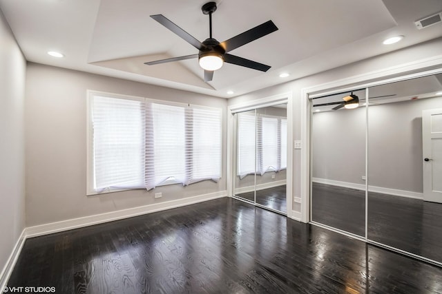 11616 S Lowe Ave, Chicago, IL 60628 - unfurnished bedroom featuring multiple closets, wood finished floors, recessed lighting, and a ceiling fan