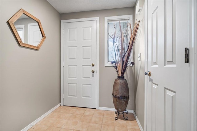 903 N Linden St Unit 131, Normal, IL 61761 - foyer featuring baseboards and light tile patterned floors