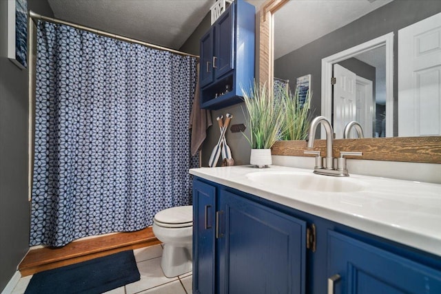 903 N Linden St Unit 131, Normal, IL 61761 - full bathroom with vanity, a textured ceiling, tile patterned flooring, and a shower with shower curtain
