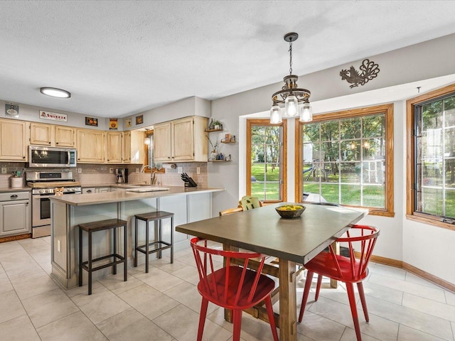 316 Harwich Pl, Rockton, IL 61072 - dining room with a chandelier, a textured ceiling, and light tile patterned floors