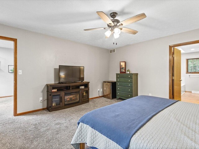 316 Harwich Pl, Rockton, IL 61072 - bedroom with carpet flooring, a textured ceiling, and a ceiling fan