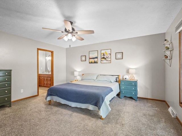 316 Harwich Pl, Rockton, IL 61072 - bedroom with carpet floors, a textured ceiling, ceiling fan, and connected bathroom