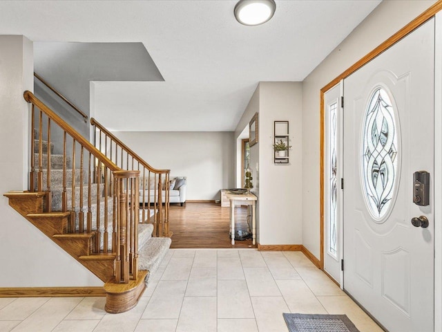 316 Harwich Pl, Rockton, IL 61072 - entryway with stairs and light tile patterned floors