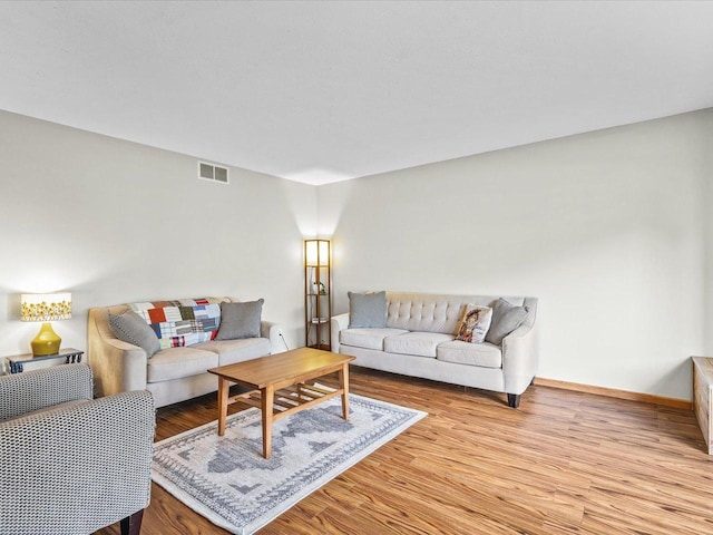 316 Harwich Pl, Rockton, IL 61072 - living area with light wood-style flooring and baseboards