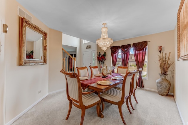 22401 Helen Dr, Sauk Village, IL 60411 - dining room featuring light colored carpet, a chandelier, and stairway