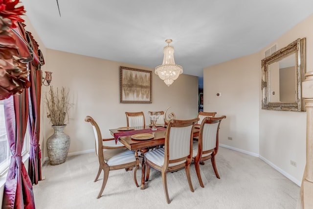 22401 Helen Dr, Sauk Village, IL 60411 - dining area featuring light carpet and a chandelier