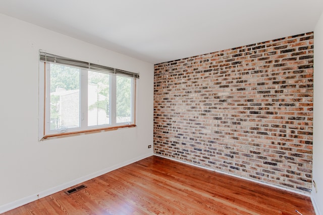 590 Green Bay Rd, Glencoe, IL 60022 - spare room with baseboards and light wood-style floors