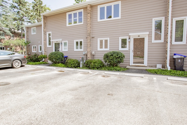 590 Green Bay Rd, Glencoe, IL 60022 - view of building exterior featuring uncovered parking