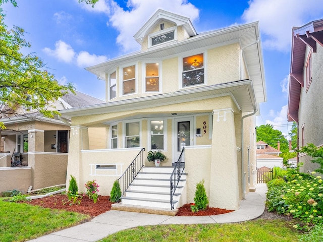 605 Home Ave, Oak Park, IL 60304 - traditional style home with a porch and stucco siding