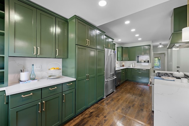 605 Home Ave, Oak Park, IL 60304 - kitchen with appliances with stainless steel finishes, green cabinets, wall chimney exhaust hood, dark wood-style floors, and recessed lighting