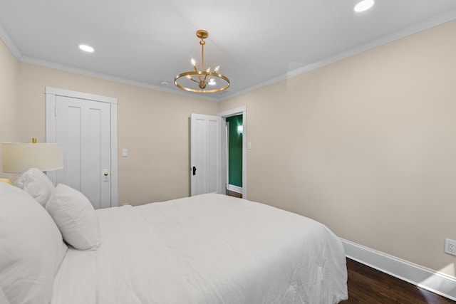 605 Home Ave, Oak Park, IL 60304 - bedroom with a chandelier, dark wood finished floors, recessed lighting, and ornamental molding