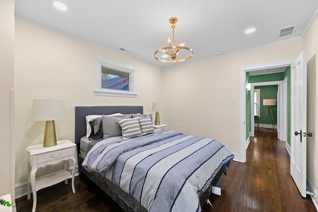 605 Home Ave, Oak Park, IL 60304 - bedroom with dark wood finished floors, ornamental molding, a chandelier, and recessed lighting