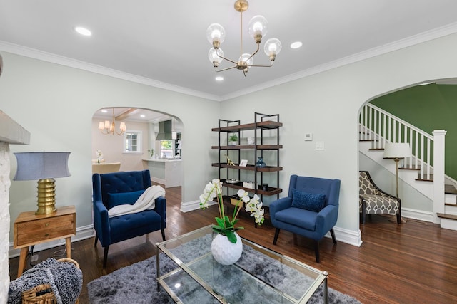 605 Home Ave, Oak Park, IL 60304 - living area featuring arched walkways, a chandelier, wood finished floors, stairway, and recessed lighting