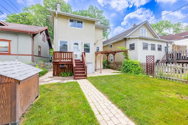 605 Home Ave, Oak Park, IL 60304 - rear view of property with a fenced backyard, a deck, and stucco siding