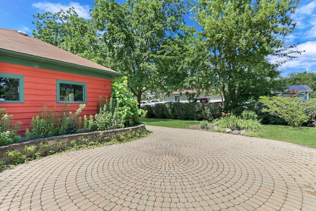 26435 N US Highway 45, Mundelein, IL 60060 - view of home's exterior with a patio and roof with shingles