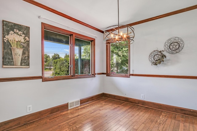 26435 N US Highway 45, Mundelein, IL 60060 - empty room with a chandelier, hardwood / wood-style flooring, and ornamental molding