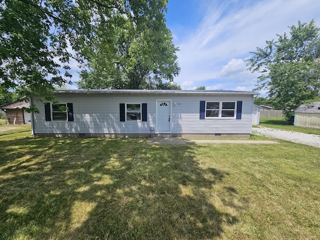 508 W Clark St, Thomasboro, IL 61878 - ranch-style house with crawl space, a front yard, and gravel driveway
