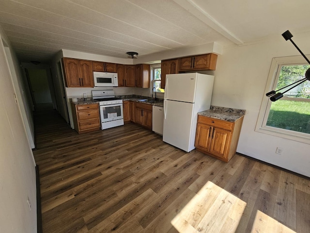 508 W Clark St, Thomasboro, IL 61878 - kitchen with white appliances, dark wood finished floors, and brown cabinets