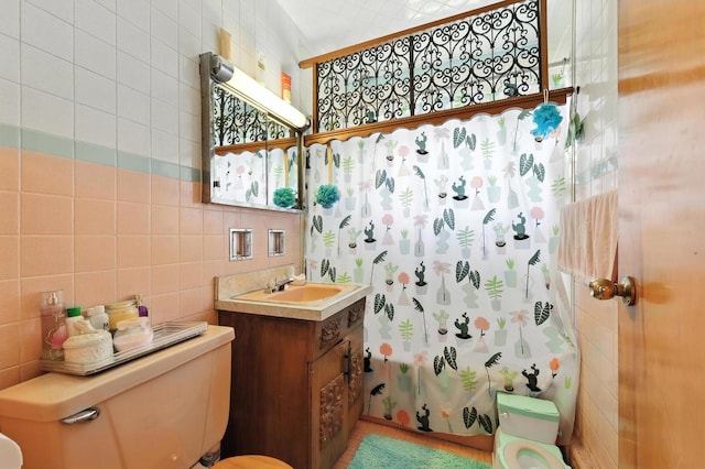 16632 Emerald Ave, Harvey, IL 60426 - bathroom with tile walls, vanity, a shower with curtain, and decorative backsplash