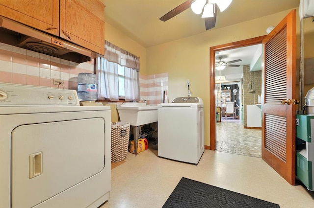 16632 Emerald Ave, Harvey, IL 60426 - laundry area featuring cabinet space, a ceiling fan, and washer and clothes dryer