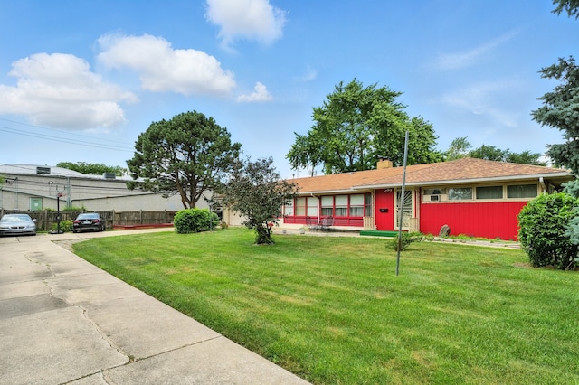 16632 Emerald Ave, Harvey, IL 60426 - ranch-style home with a front lawn and a chimney