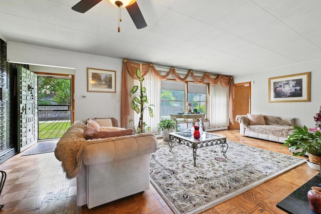 16632 Emerald Ave, Harvey, IL 60426 - living room featuring plenty of natural light, a ceiling fan, and a baseboard radiator