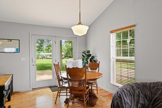 21 County Road 1200 N, Neoga, IL 62447 - dining area featuring vaulted ceiling and light wood-style floors