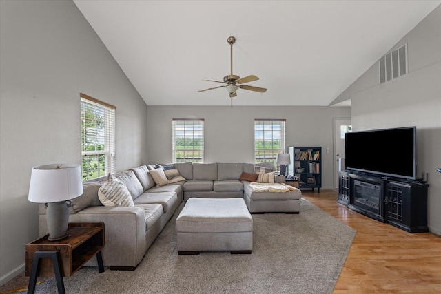 21 County Road 1200 N, Neoga, IL 62447 - living area with healthy amount of natural light, ceiling fan, light wood-type flooring, and high vaulted ceiling