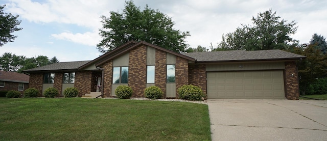 6924 Cody Ln, Rockford, IL 61107 - view of front facade with a garage, concrete driveway, a front yard, and brick siding