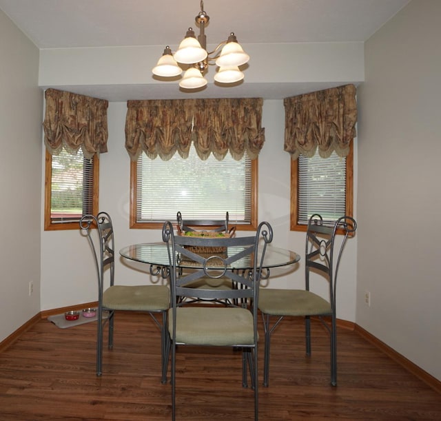 6924 Cody Ln, Rockford, IL 61107 - dining space featuring a chandelier and wood finished floors