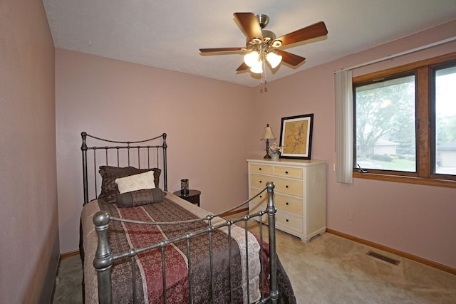 6924 Cody Ln, Rockford, IL 61107 - bedroom featuring light carpet and baseboards