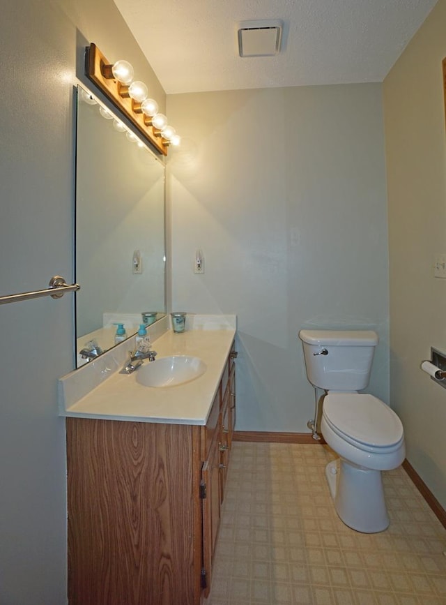 6924 Cody Ln, Rockford, IL 61107 - half bathroom with tile patterned floors and vanity