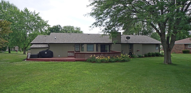 6924 Cody Ln, Rockford, IL 61107 - rear view of property featuring a wooden deck and a yard